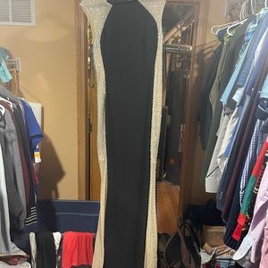 Long black beaded dress.. think prom, black tie event!